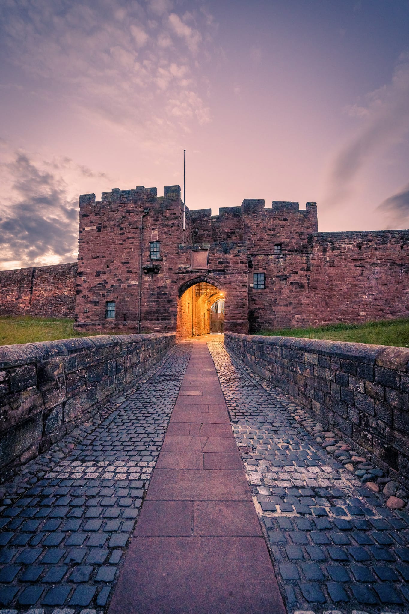 Carlisle Castle gatehouse at dusk, home city of JJM Networks IT support in Cumbria