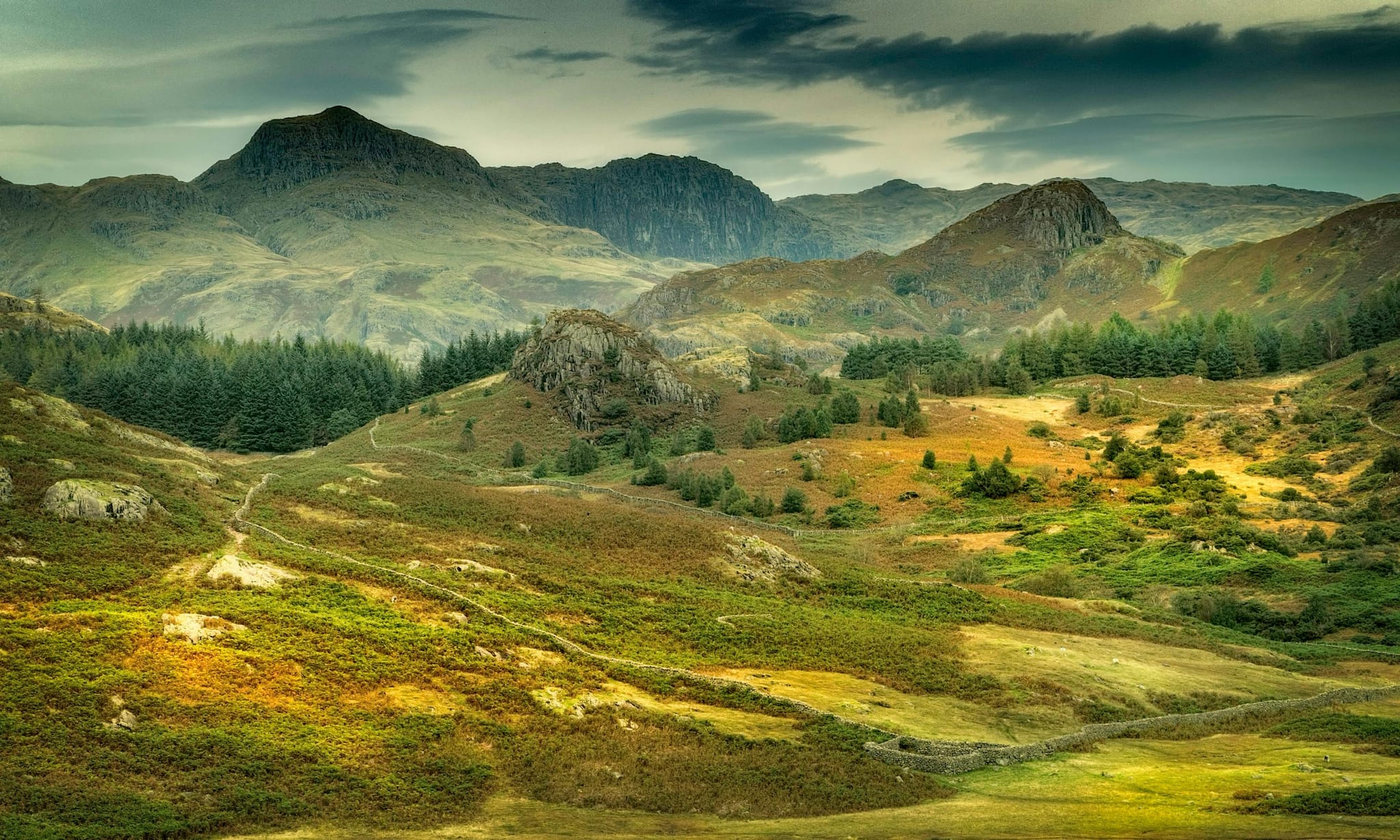 The Langdale Pikes under heavy cloud in the Lake District, part of the Cumbria region served by JJM Networks IT support