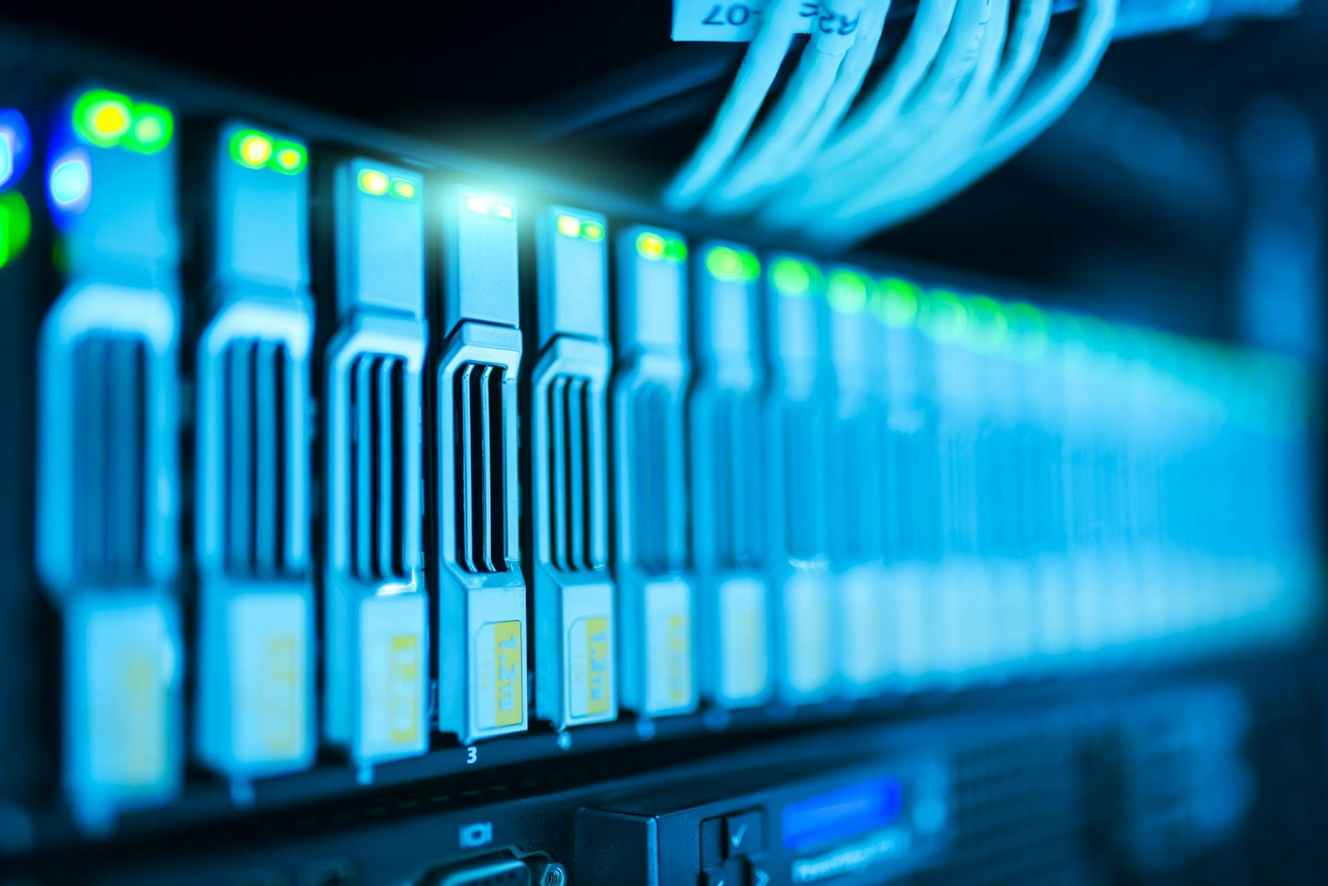 A neatly cabled comms rack with structured network cabling, the kind of business network infrastructure JJM Networks installs across Cumbria